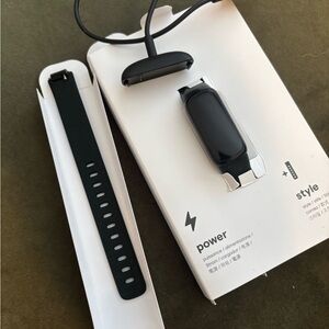 Black Fitness Tracker by FitBit